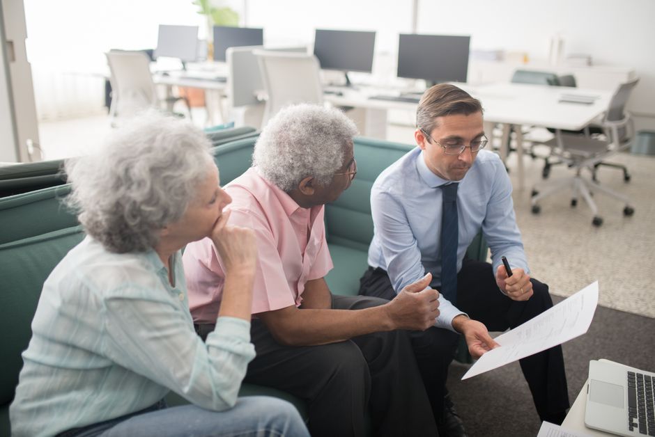 Early retirees reviewing the best health insurance options for 2026 at home
