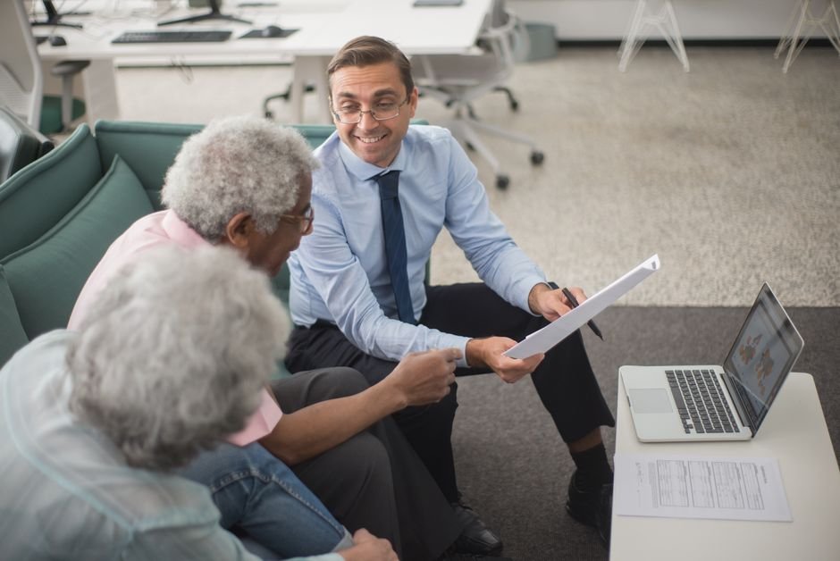 Family comparing health sharing ministries vs health insurance paperwork